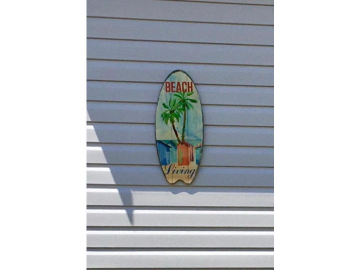 SHELLHARBOUR BEACH COTTAGE ---- Walk out back gate to beach flags in summer Guest house, Shellharbour - imaginea 13