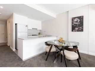 Stylish 2BR Apartment with Balcony Apartment, Bankstown - 1