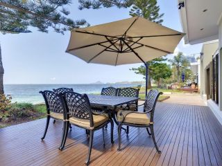 Whispering Sands', 10 Sandy Point Road - Luxury waterfront home with aircon, WIFI & Foxtel Guest house, Corlette - 1